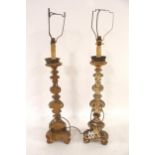 A PAIR OF 18TH CENTURY STYLE GILTWOOD AND GESSO CANDLESTICKS  converted as lamps, with painted