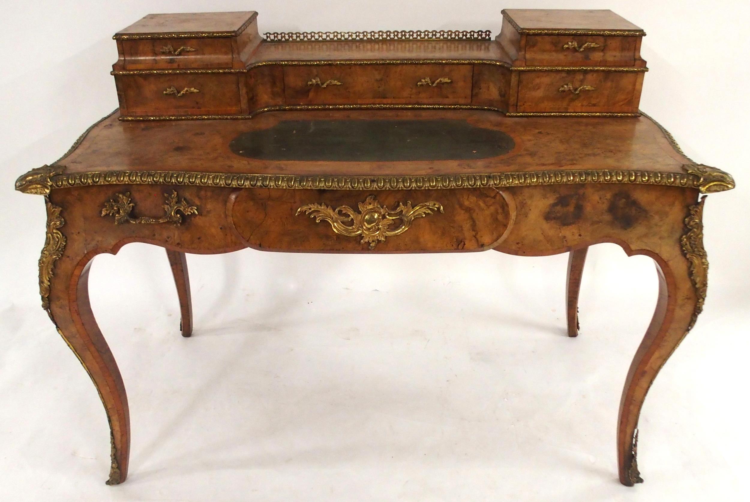 A LOUIS XVI STYLE BURR WALNUT AND ORMOLU MOUNTED BUREAU PLAT with five drawered superstructure