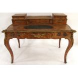 A LOUIS XVI STYLE BURR WALNUT AND ORMOLU MOUNTED BUREAU PLAT with five drawered superstructure