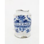 AN 18TH CENTURY DUTCH DELFT BLUE AND WHITE DRUG JAR painted with Hillebor (Hellebore), surrounded by