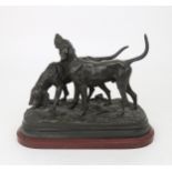 AFTER ALFRED DUBUCAND  A sculpture of two hunting dogs, signed A Dububand, 31cm long Condition