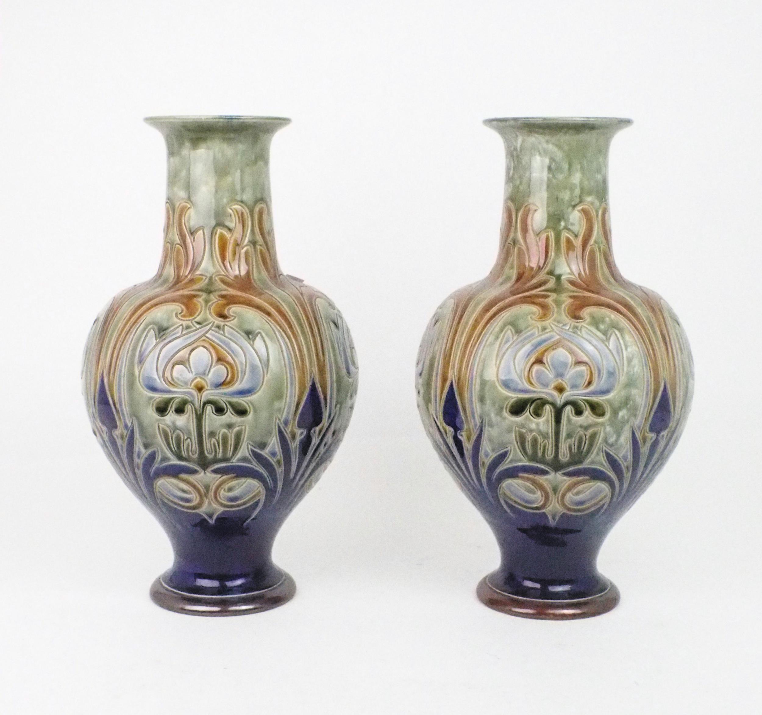 A PAIR OF ROYAL DOULTON VASES designed by Frank A Butler, of bulbous form with flaring neck