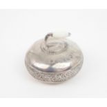 A GEORGE V NOVELTY SILVER PAPERWEIGHT modelled as a curling stone, with inscription 'The Twenty
