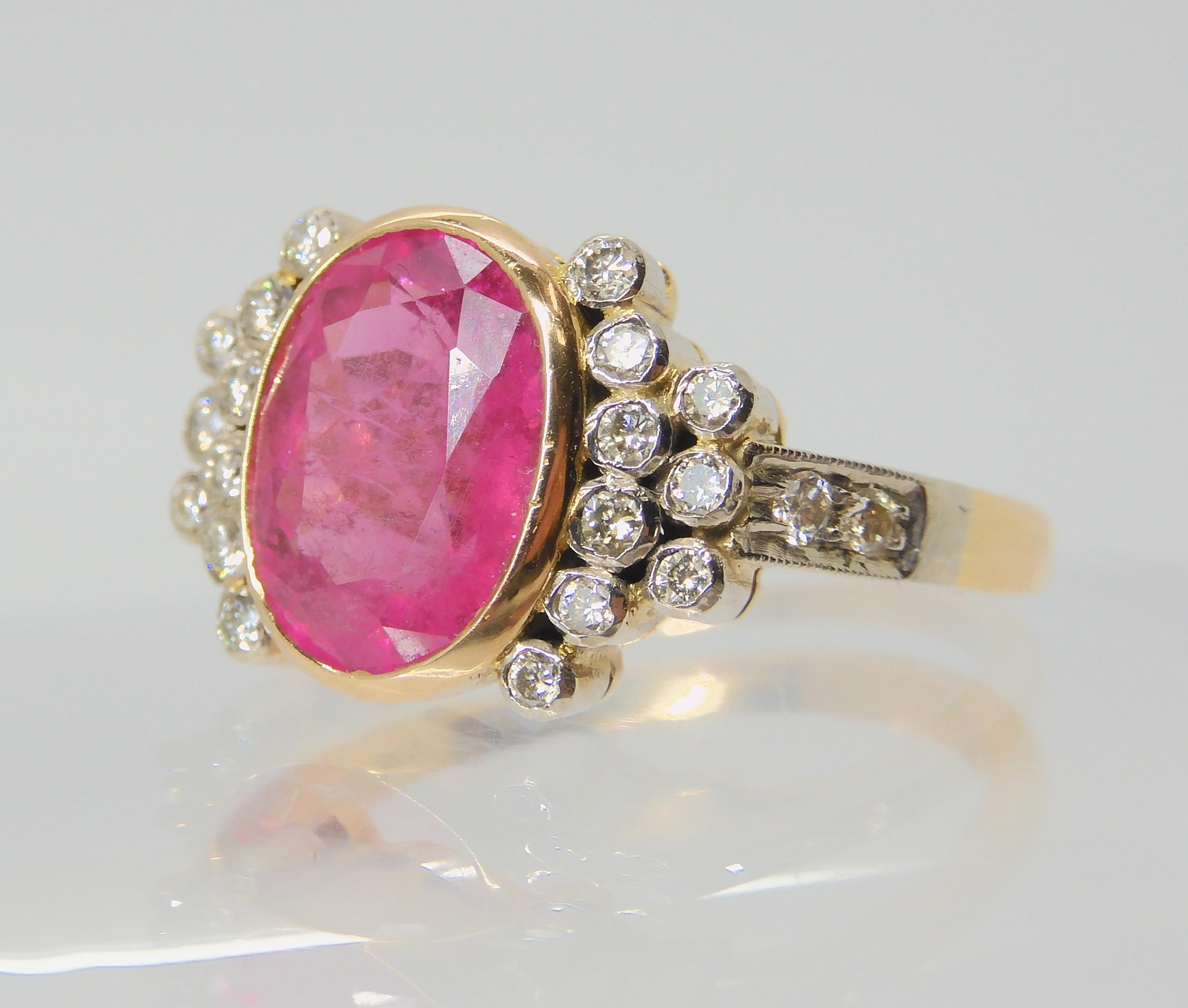 A PINK TOURMALINE AND DIAMOND RING the mount is stamped 750 for 18ct, and set with a 10.8mm x 8. - Image 6 of 10