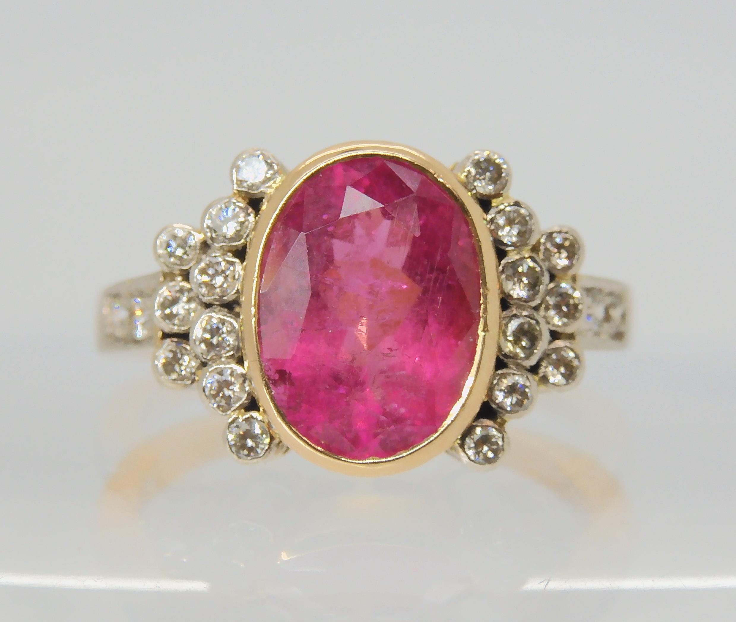 A PINK TOURMALINE AND DIAMOND RING the mount is stamped 750 for 18ct, and set with a 10.8mm x 8. - Image 3 of 10