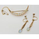 AN OPAL CRESCENT BROOCH & EARRINGS the brooch set with oval cabochon opals, largest approx 6mm x 4mm