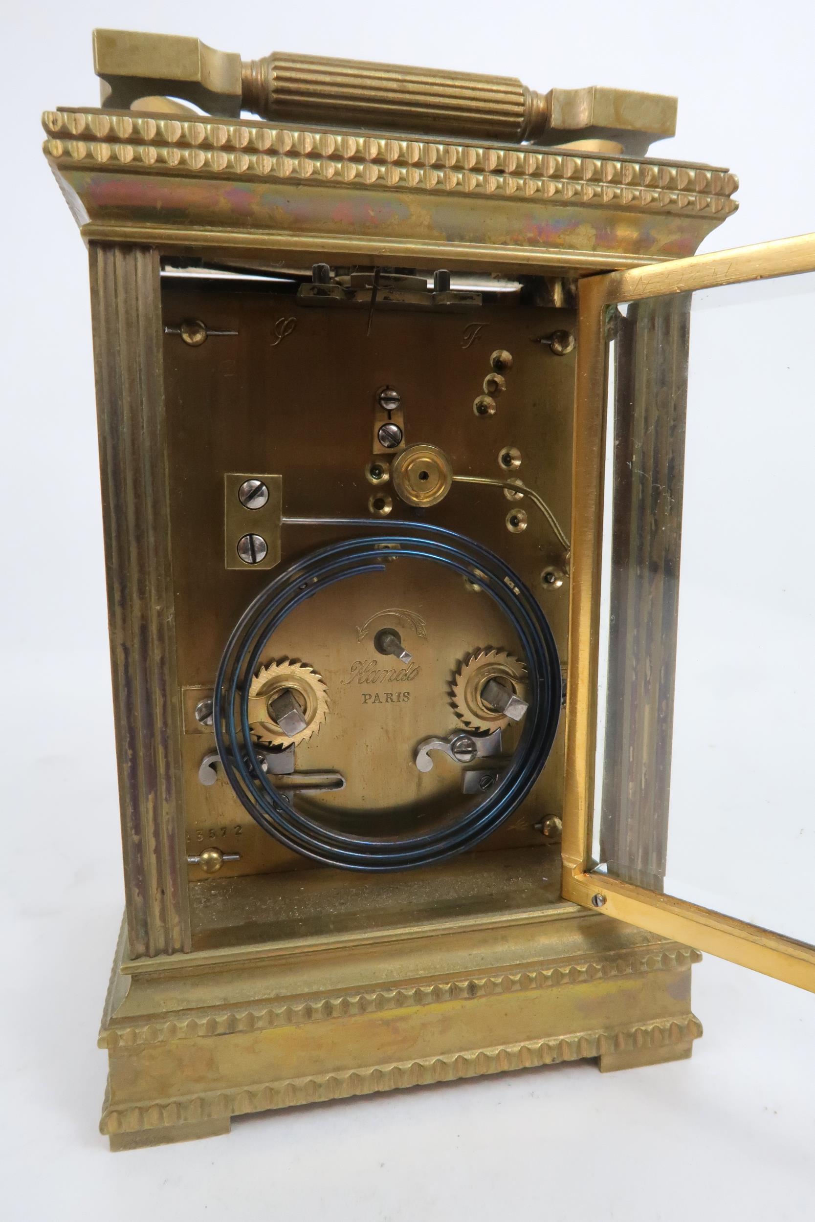 A FRENCH BRASS AND GLASS REPEATING CARRIAGE CLOCK the gilded face with applied column and arch - Image 3 of 5