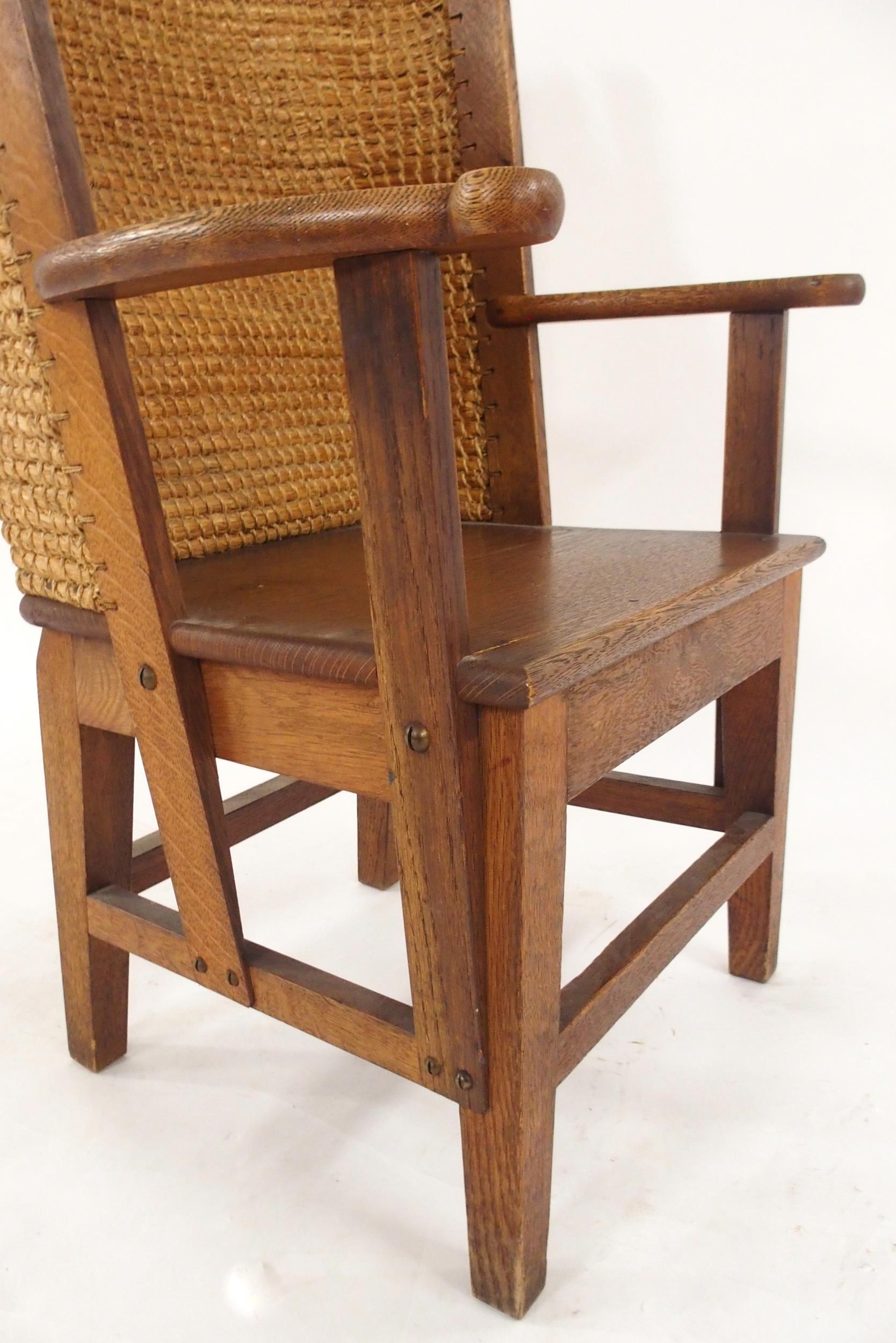 A 19TH CENTURY OAK FRAMED ORKNEY CHAIR with rushed back and shaped arms on stretchered square - Image 5 of 6
