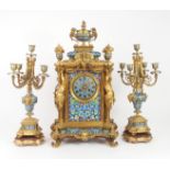 AN IMPRESSIVE 19TH CENTURY FRENCH CHAMPLEVE ENAMEL MANTLE CLOCK the urn mounted top with griffin han