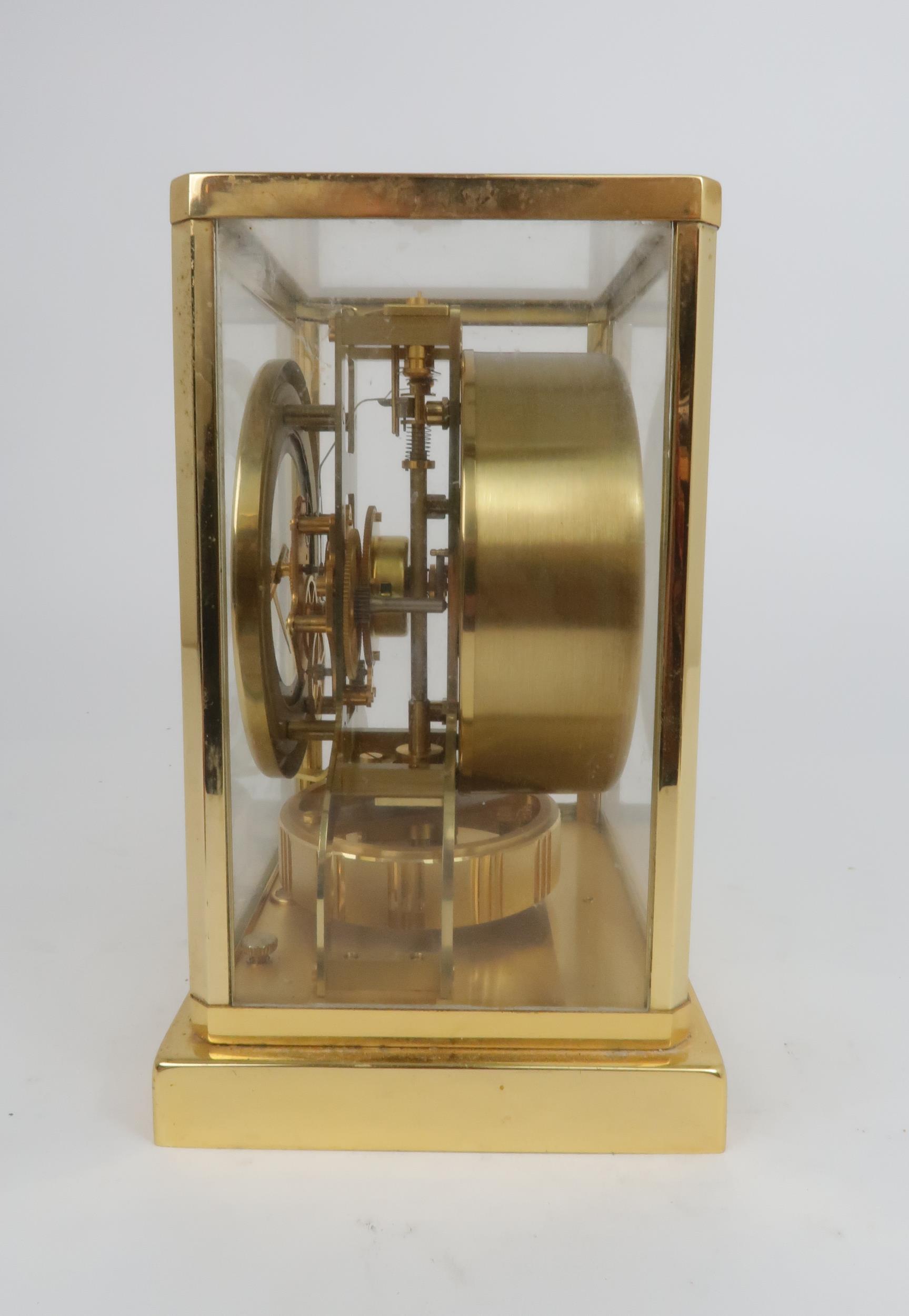 A JAEGER LE COULTRE ATMOS CLOCK in glazed brass case, the white enamel chapter ring with applied - Image 2 of 5