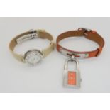 HERMES & BULGARI WATCHES Hermes watch with orange leather strap, and stainless steel padlock style