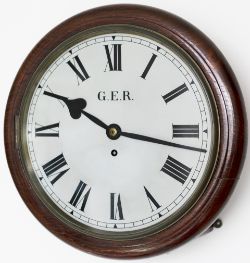 Great Eastern Railway 12in dial teak cased railway clock with a cast brass bezel. The rectangular