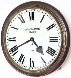 Great Eastern Railway 16in dial teak cased railway clock with a cast brass bezel. The rectangular