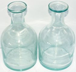 A pair of GWR glass Water Carafes. Both acid etched to the front with the GWR Roundel and stand 7in