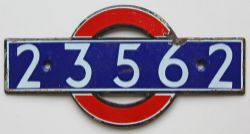 London Underground enamel bullseye from driving car 23562. Measures 5.5in x 2.75in and is in very