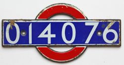 London Underground enamel bullseye from driving car 014076. Measures 5.5in x 2.75in and is in very