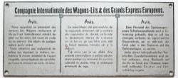 Wagon Lits warning notice in three languages, French, Romanian and German. Roughly translates to -