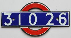 London Underground enamel bullseye from driving car 31026. Measures 5.5in x 2.75in and is in very