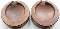Deltic piston crowns, a pair neatly cut to form paperweights or ashtrays. (2 items)
