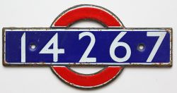 London Underground enamel bullseye from driving car 14267. Measures 5.5in x 2.75in and is in very