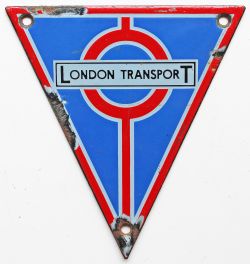 London Transport Bus RT radiator badge. Approximately 6in x 5.75in triangular enamel. Some damage as