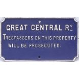 GCR cast iron Trespass Sign in restored condition, white lettering on a blue ground.