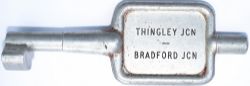 BR-W Tyers No9 single line aluminium key token THINGLEY JCN - BRADFORD JCN. In ex railway condition.