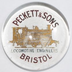 Glass paperweight, base marked PECKETT & SONS LOCOMOTIVE ENGINEERS BRISTOL with an image of an 0-6-