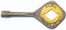 BR-S Tyers No9 single line bronze key token HALWILL - HOLSWORTHY. From the former London & South