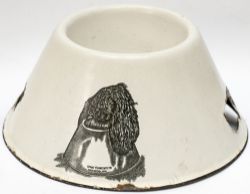Advertising enamel dog bowl SPRATT'S PATENT LIMITED with image of a dogs head feeding at the bowl.