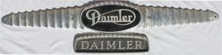 A pair of alloy DAIMLER Bus Badges, the larger one being 45in long and has not been carried. The