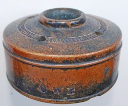 GWR earthenware Landmine Inkwell suitably inscribed on the side with company initials. Measures 4.