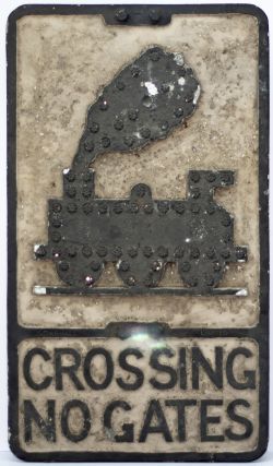 Road motoring sign CROSSING NO GATES with an 0-6-0 locomotive and glass bead reflectors and makers