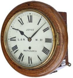 London & North Western Railway 8 inch oak cased fusee railway clock with a spun brass bezel and a