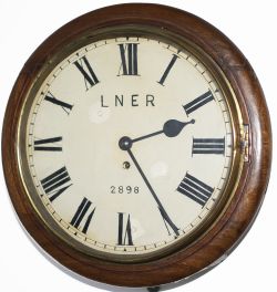 North Eastern Railway 12in dial mahogany cased railway clock with a spun brass bezel and a chain