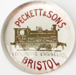 Glass paperweight, base marked PECKETT & SONS LOCOMOTIVE ENGINEERS BRISTOL with an image of an 0-6-