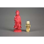 A Japanese ivory netsuke and a Chinese ivory chess piece