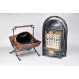 A Wilson Matheson cast iron gas fire and a copper coal scuttle