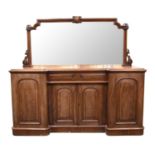 A mid-Victorian mahogany mirror-back breakfront sideboard