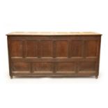 A large 19th century oak, 6-panelled coffer