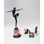 An Art Deco style bronze figure and three other smaller bronzes