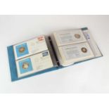 An album containing ten official United Nations medallic first day covers
