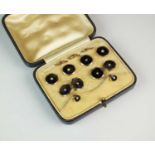 A cased set of split seed pearl set dress studs and cufflinks