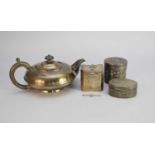 A silver teapot, a silver tea caddy, two white metal boxes and a bar brooch
