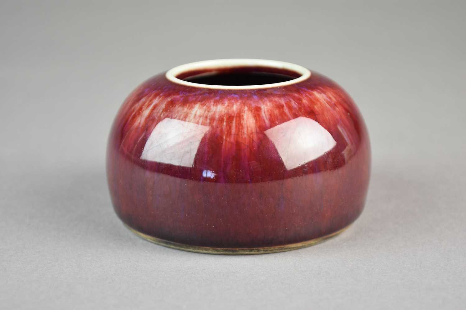 A Chinese copper red 'flambe' brush washer