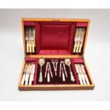 A cased dessert/fruit canteen of silver plated flatware