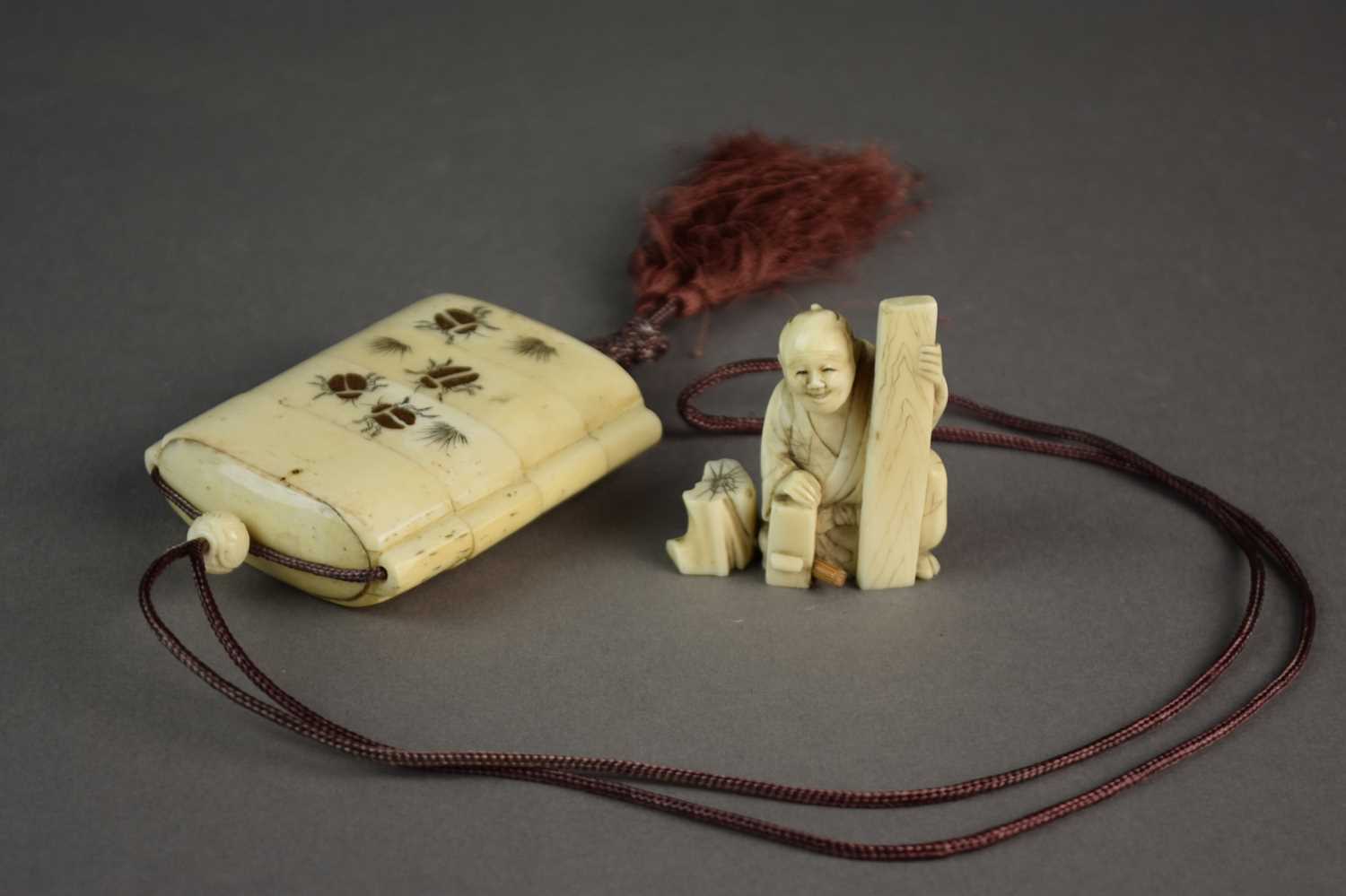 A Japanese bone inro and an ivory okimono