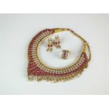 A suite of synthetic ruby, white sapphire and cultured pearl gilt jewellery