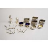 A collection of silver cruets and spoons