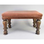 A 19th century mahogany upholstered stool
